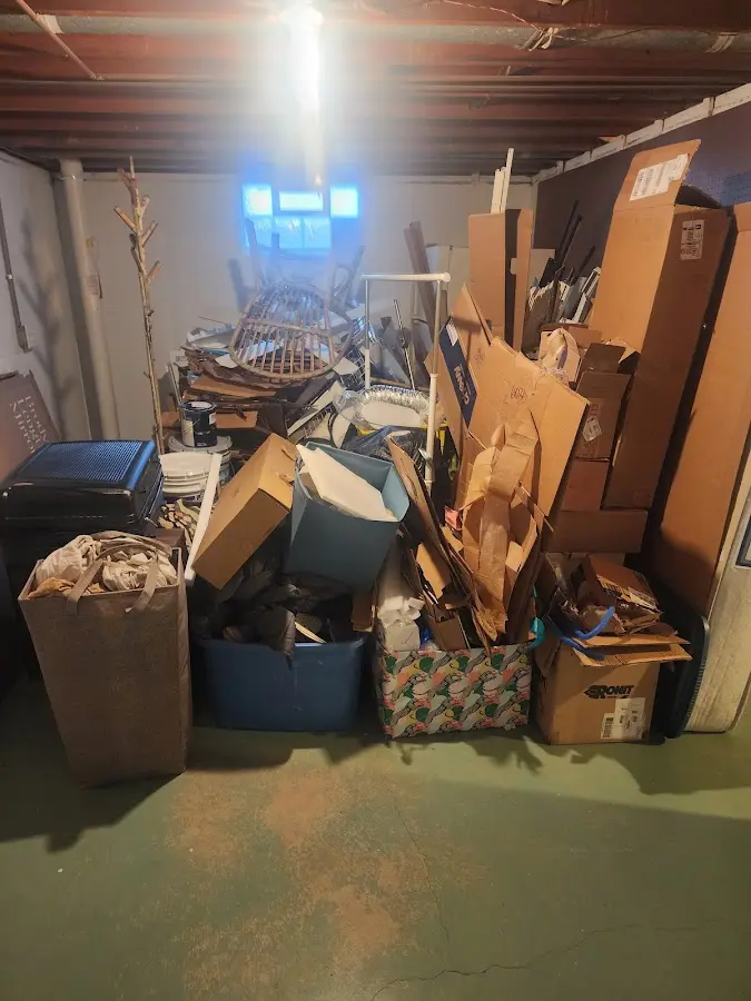 Roll-off dumpster container at job site for Yard Waste Dumpster Rental in Maplewood